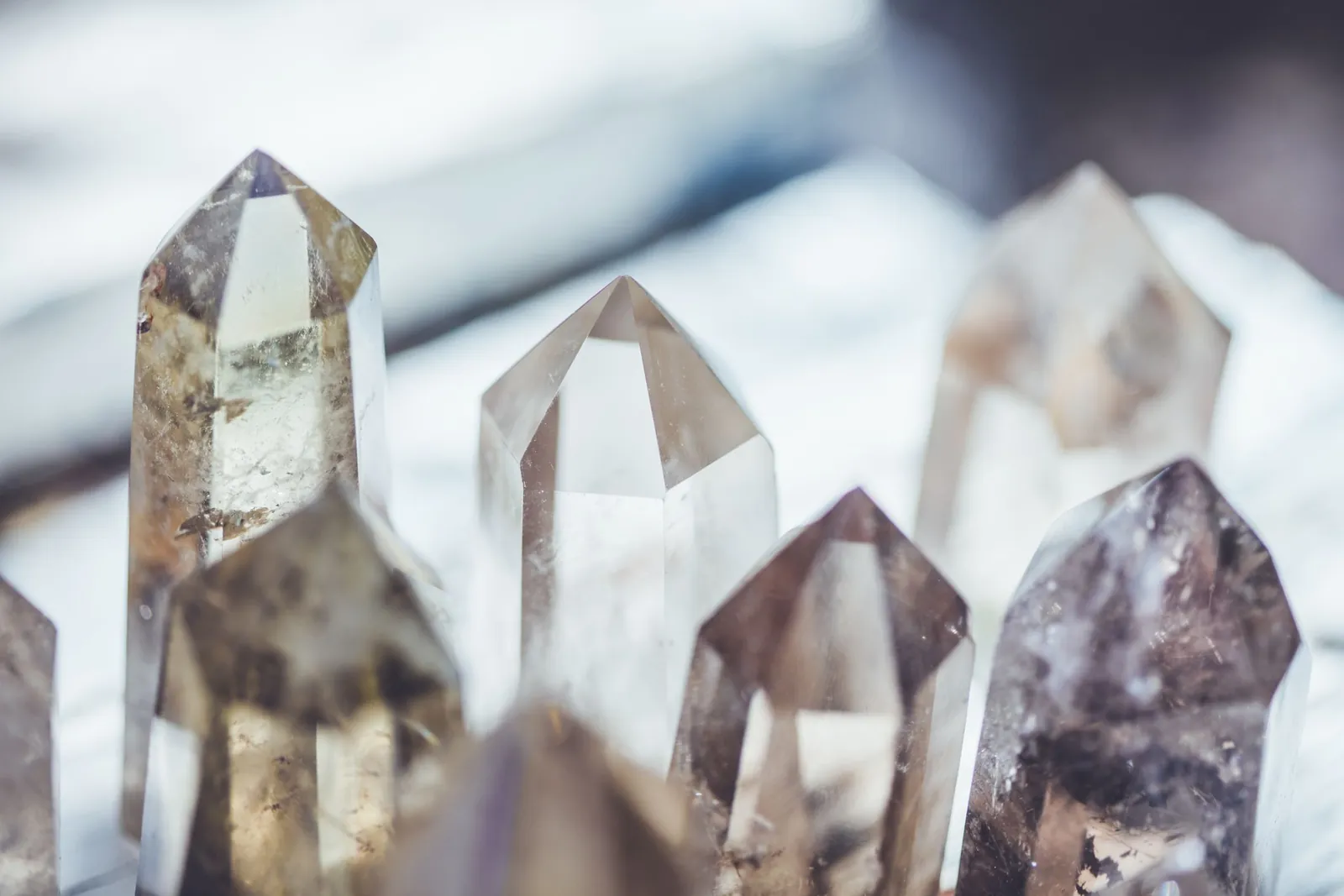 A group of polished quartz points standing in daylight